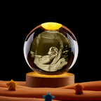 Pregnancy gift crystal ball with warm ambient light for nursery decor. Perfect for lifestyle shots in a nursery or bedside setting.